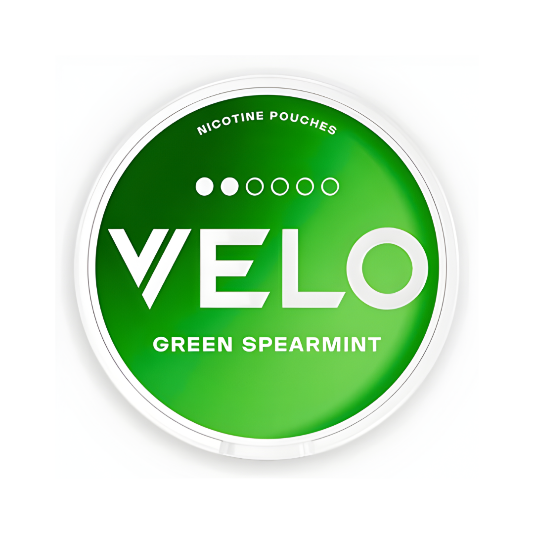 Front view of the Velo Green Spearmint snus can featuring a circular design, green and white colors, and flavor label.
