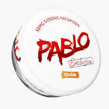 Detail close-up of Pablo Exclusive Cola pouch showing round shape and logo on a white background