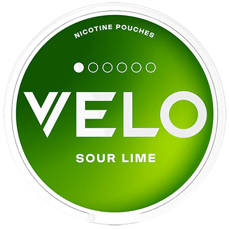 Detail close-up of Velo Sour Lime Mini nicotine pouches in a circular tin, featuring green and white colors.