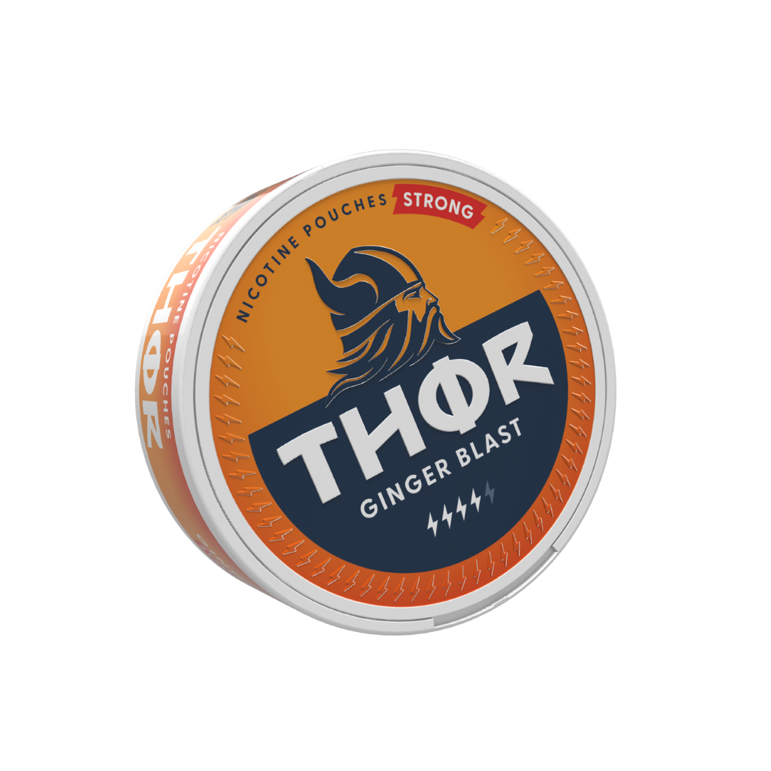Front view of the circular Thor Ginger Blast Strong nicotine pouch can featuring orange, black, and white colors with a fl…