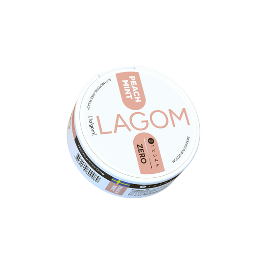 Detail close-up of Lagom Peach Mint 0mg in a round container with a minimalist label design, featuring peach and white col…