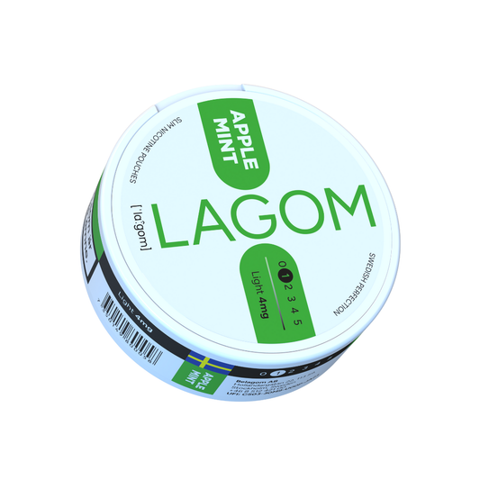 Detail close-up of the Lagom nicotine pouch container in white and green with a screw top and label text.