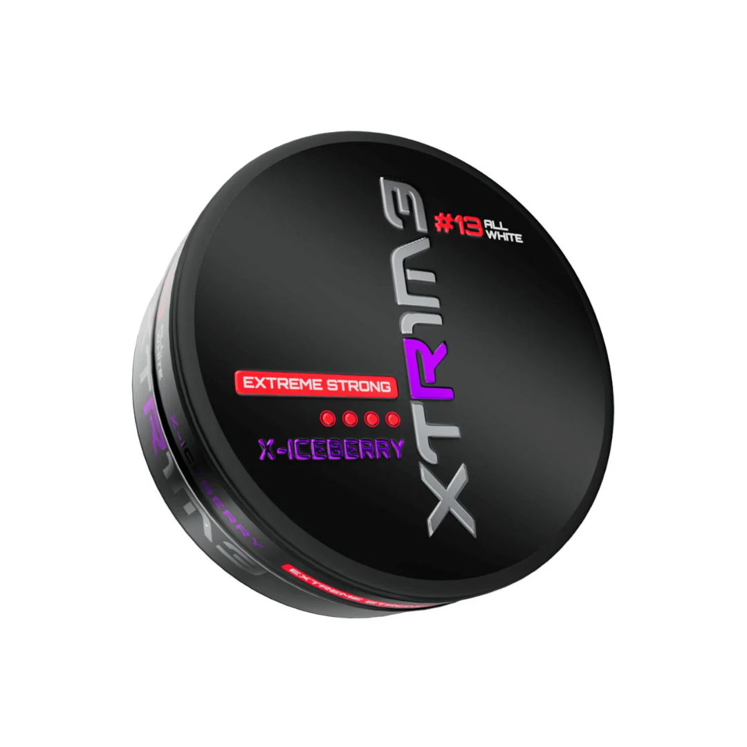 Detail close-up of the round black and purple container of Xtrime X-Iceberry snus with a matte finish.