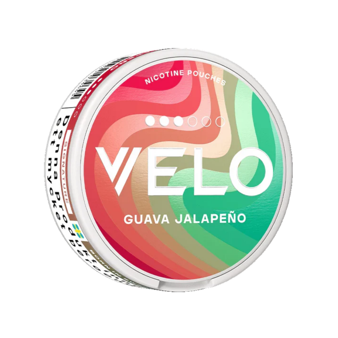 Detail close-up of the Velo Guava Jalapeño snus can showcasing a swirl design in green, red, and white.