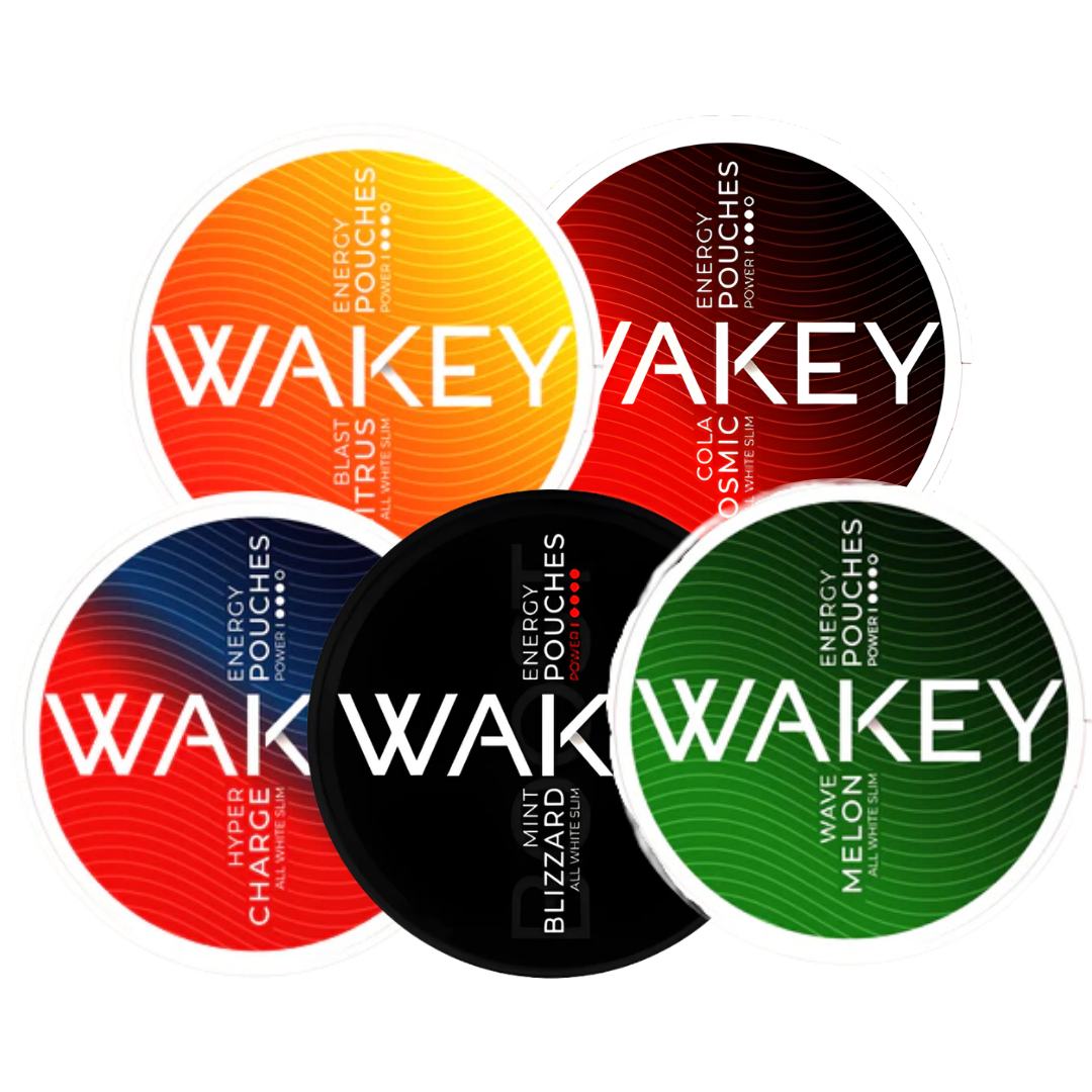 Front view of vibrant Wakey drink mix packets in red, orange, black, and green with circular design.