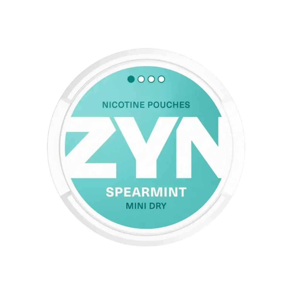 Detail close-up of ZYN spearmint pouch in a round teal and white container.