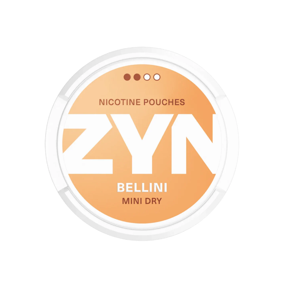 Detail close-up of ZYN nicotine pouch in a circular container with orange and white colors and bold lettering.