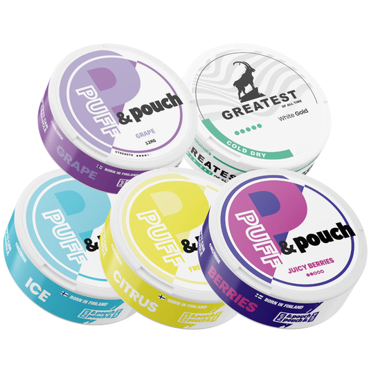 Front view of a variety of colorful cans featuring different flavors on a white background.