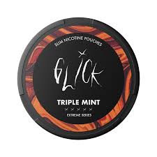 Detail close-up of Glick product container featuring black and orange colors with graphic design.